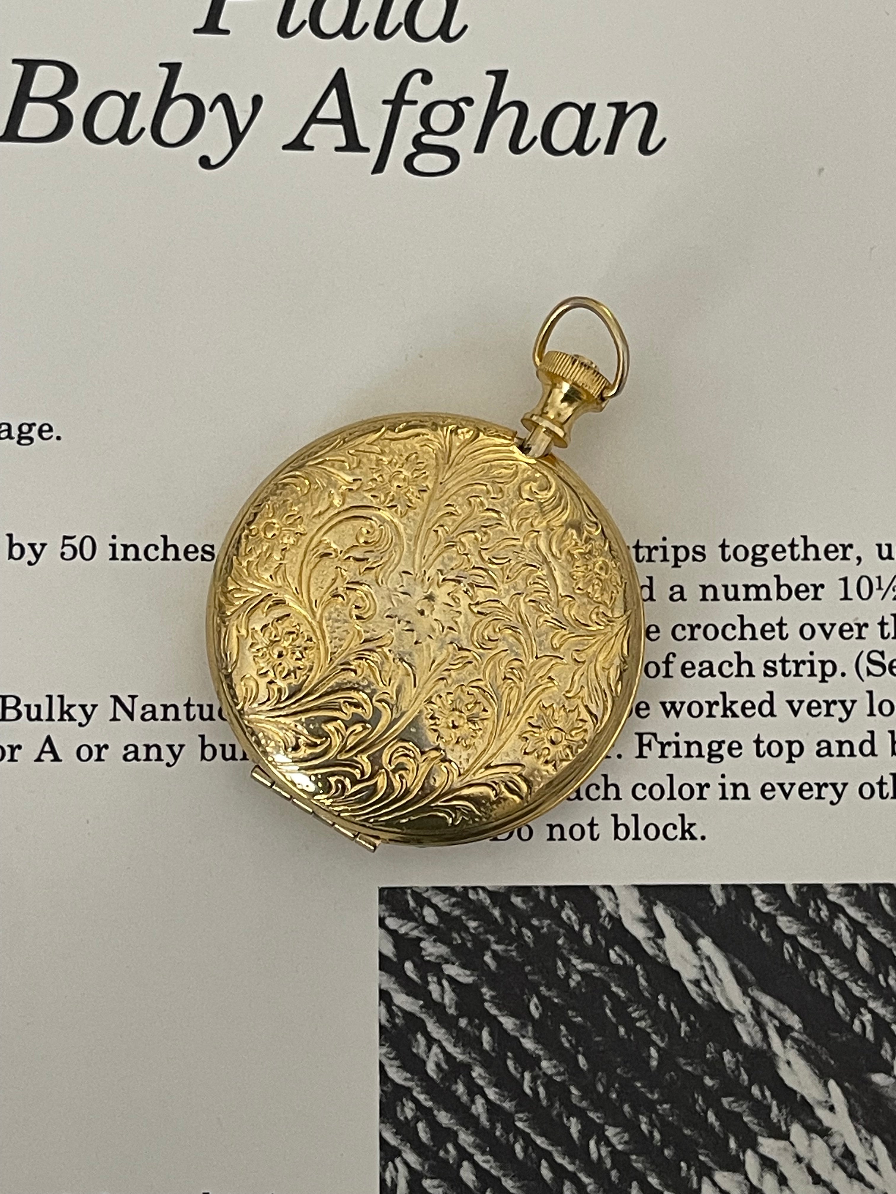 Gold pill case locket